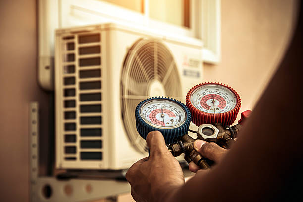 Professional Air Conditioning Service technician working in Thermal, CA